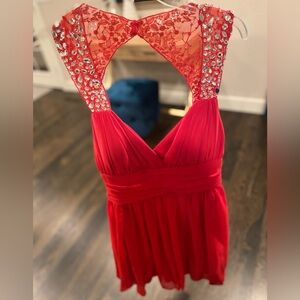 B. Smart red cocktail dress with open back & diamond like beading detail size 15
